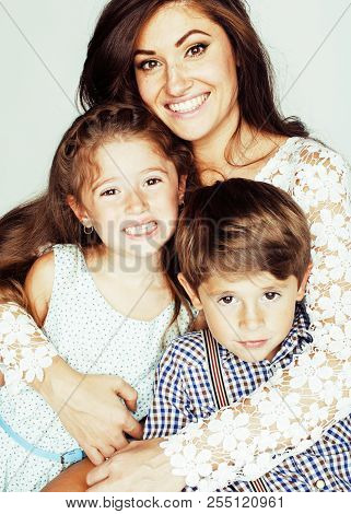 Young Mother With Two Children On White Background, Happy Smilin