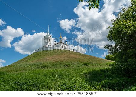 Church Standing On A High And Green Hill