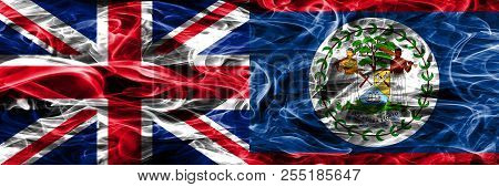 United Kingdom Vs Belize Smoke Flags Placed Side By Side. Thick Colored Silky Smoke Flags Of Great B