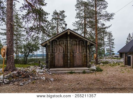 Luosto Finland, Wooden Traditional Toilet In The Forest At Luosto
