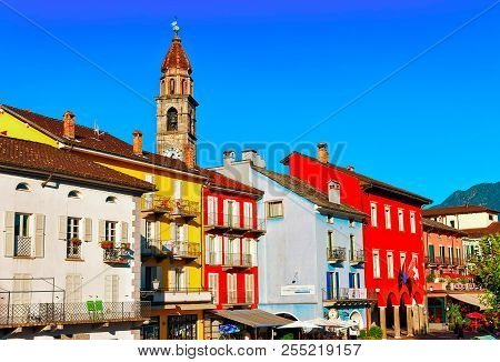 Ascona, Switzerland - August 23, 2016: St Peter And Paul Church Tower  And Facades Of Buildings At T