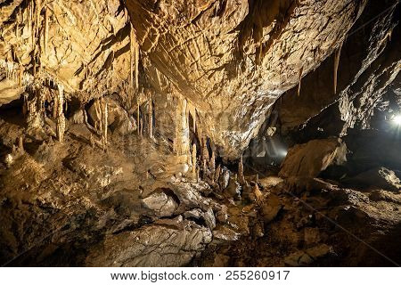 Illuminated Dropstones, Stalactitesand Stalagmites In Baradla Cave, Hungary