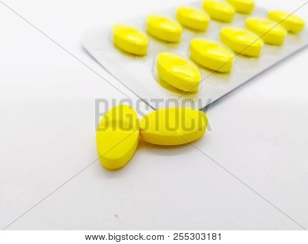 Medication And Healthcare Concept. Many Yellow Pills Of  Paracetamol (acetaminophen) 450 Mg Combined
