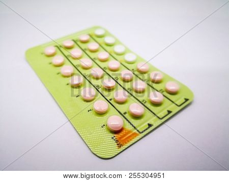 Medication And Healthcare Concept. Oral Contraceptive Drug. 24 Orange Pills Consist Of Ethinyl Estra