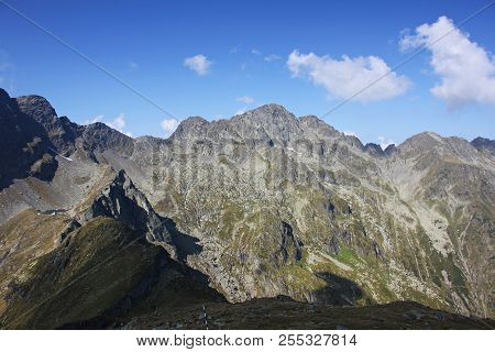 Landscape With Mountains Under Blue Sky During Summer