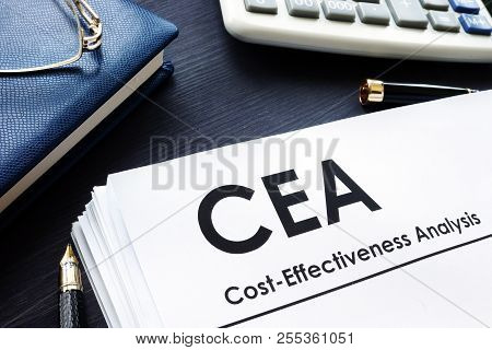 Cost Effectiveness Analysis Cea Report On A Desk.