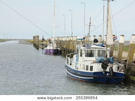 Noordpolderzijl. August-26-2018. Boats In The Harbour Of Noordpolderzijl. The Netherlands