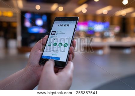Chiang Mai, Thailand - August 03,2018: Woan Hands Holding Huawei With Uber Apps. Uber Is Smartphone