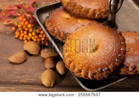 Round Dutch Homemade Cookies Filled With Marzipan And Almonds Nuts, Autumn And Winter Seasonal Desse