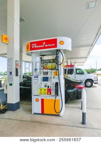 Orlando, Usa - May 8, 2018: Filling Nozzles At A Shell Gas Station At Orlando, Usa On May 8, 2018. S
