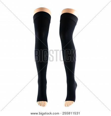 Black Stockings On Leg Of A Mannequin, Isolated On White