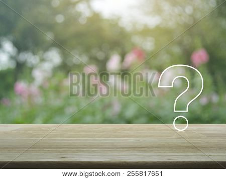 Question Mark Sign Flat Icon Over Blur Pink Flower And Tree In Garden, Business Customer Support Con