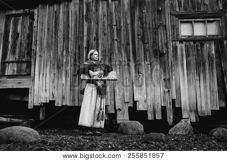 Portrait Of Beautiful Girl With Music Instrument Gusli