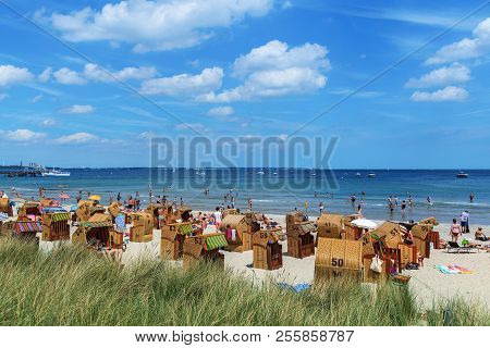 Public Beach, Shore Of The Baltic Sea In Timmendorfer Strand. Beautiful Landscape With  View To Sea 