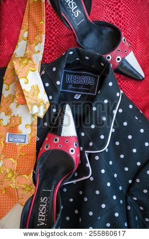 GOMEL, BELARUS - AUGUST 16, 2018: Versus (Versace) women's shoes, blazer and tie. Versus (Versace) is the diffusion line of Italian luxury fashion house Versace.