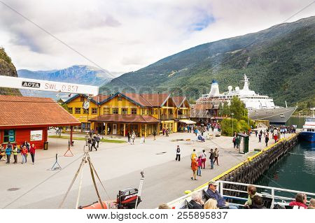 Flam, Norway-august 16, 2014 -  People And Cruise Ships In Flam Village Port.