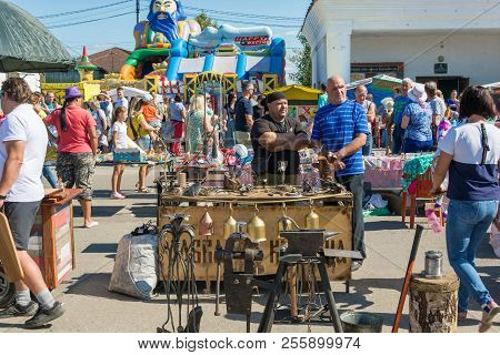 Blacksmith With His Products At The Regional Festival-fair Luk-luchok August 25, 2018 In The City Of