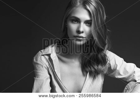 Fashion Model With Long Hair, Perfect Skin Is Posing In Studio For Glamour Test Photo Shoot Showing 