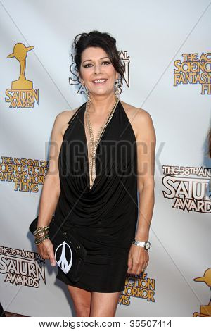 LOS ANGELES - JUL 26: Marina Sirtis anländer på 2012 Saturn Awards på Castaways den 26 juli, 2012