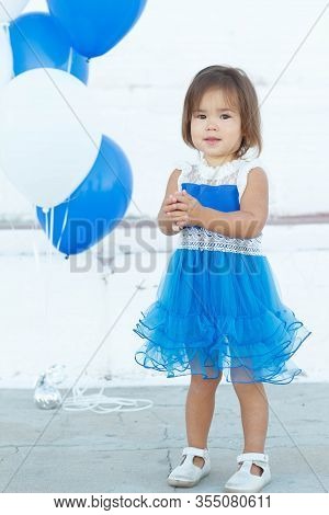 Pretty Baby In Blue Dresses On A Walk