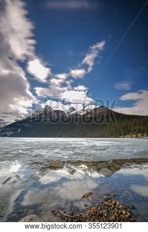 Mount Fairview, Partly Frozen Lake, Lake Louise Banff National Park, Alberta Canada