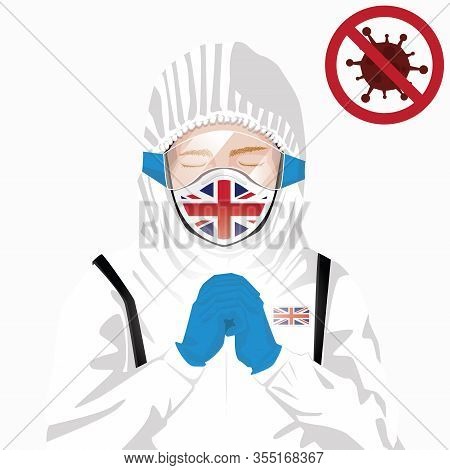 Covid-19 Or Coronavirus Concept. British Medical Staff Wearing Mask In Protective Clothing And Prayi