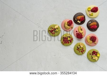 French Chocolate Medians On A Gray Background