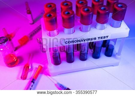 Coronavirus Blood Test Concept. Analyzing Blood Sample In Test Tube For Coronavirus Test. Test Tube