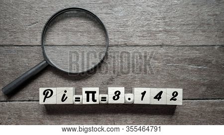 Inspirational Of Pi Day Celebration - Text Pi = π = 3.142 Written On Wooden Block
