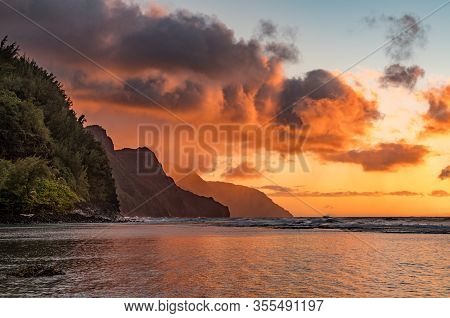 Sunset Lights The Receding Cliffs Of The Napali Coastline On North Coast Of Kauai In Hawaii