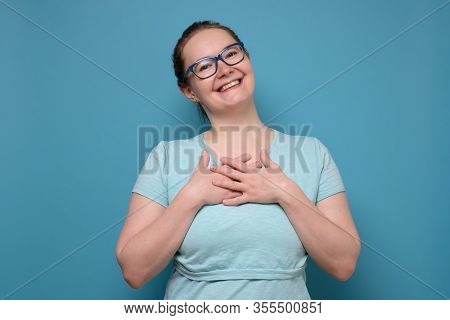 Woman Smiling, Expressing Positive Emotions And Feelings Being Pleased With Compliment.