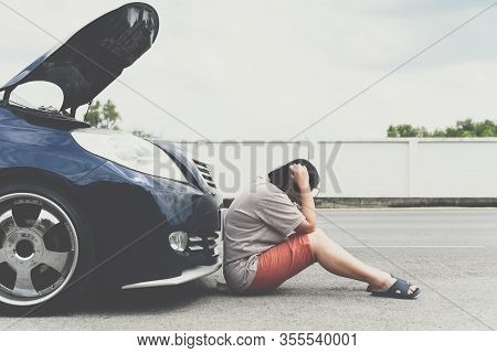 Asian Woman 40s Alone Driver Checking A Car Engine For Fix And Repair Problem With Unhappy And Disma