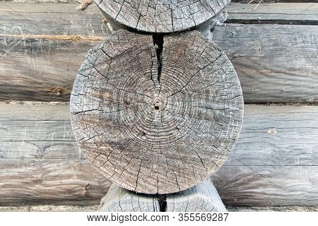 Old Logs.cross Section Of A Tree Trunk. Wooden Texture, Background. Old Wood. Cut Of A Log. Old Tree