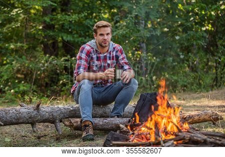 Man Relaxing In Park. Hiking Adventure. Picnic In Tourism Camp. Drink Coffee At Picnic Campfire. Get