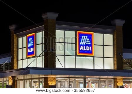 Aldi Grocery Store At Night And Trademark Logo