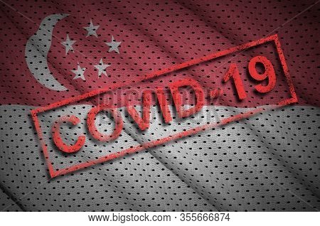 Singapore Flag And Red Covid-19 Stamp. Coronavirus 2019-ncov Outbreak