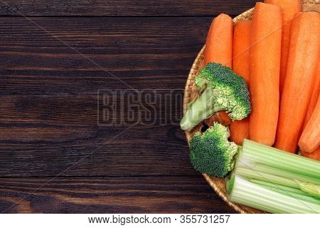 Fresh Vegetables On A Wooden Table. Healthy, Vegetarian Food. Natural Vitamins. Carrot, Broccoli, An