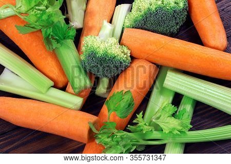 Fresh Vegetables On A Wooden Table. Healthy, Vegetarian Food. Natural Vitamins. Carrot, Broccoli, An