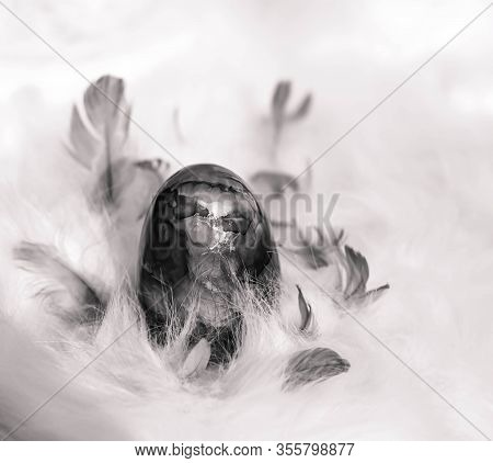 Easter Background With Easter Eggs. Soft Focus, Bokeh Effect. Happy Easter Greeting Card Template In