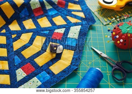 Fragment Of A Quilt, Surrounded By Tools For Quilting