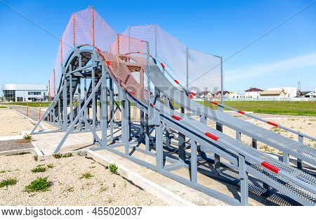 Customized Off-road Obstacles At The Car Testing Ground In Summer Day