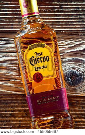 Bottles Of  Tequila Jose Cuervo On A Wooden Table