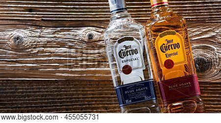 Bottless Of  Tequila Jose Cuervo On A Wooden Table