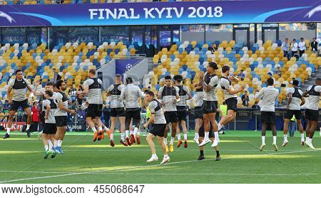 Kyiv, Ukraine - May 26, 2018: Liverpool Players Run On The Pitch During Training Session Before Uefa