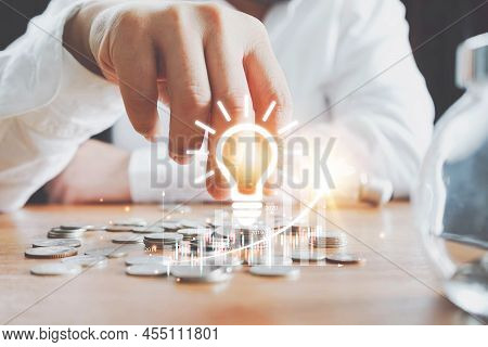 saving energy and money concept. idea for save or investment. saving money concept putting money coi