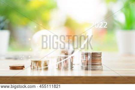 Saving Energy And Money Concept. Idea For Save Or Investment. Saving Money Concept Putting Money Coi