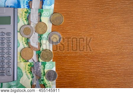 Calgary, Alberta - April 21, 2022: Finance Concept With Candian Curreny And Copy Space.
