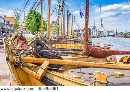 Harderwijk, Netherlands - May 22, 2022: Traditional Ducth Wooden Sailing Ships At The Quay In Harder