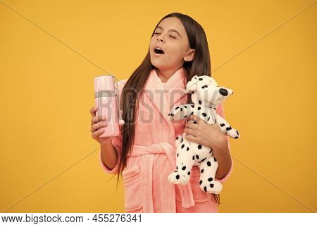 Childhood Happiness. Good Morning. Sleepy Kid Wear Nightsuit Play With Toy. Child In Cozy Sleepwear.