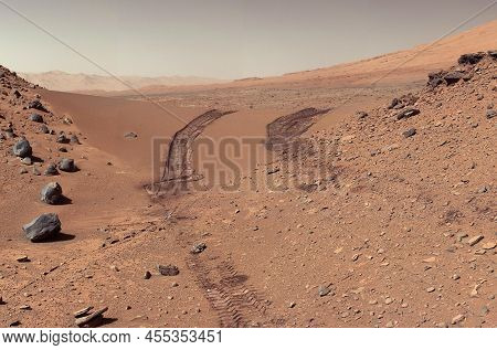 Landscape On Planet Mars. Rover After Crossing A Dune. Elements Of This Picture Furnished By Nasa.